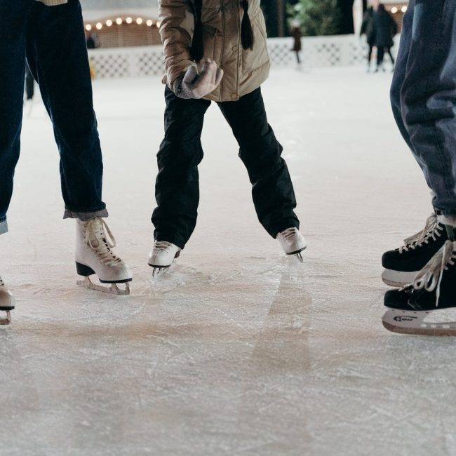people ice skating together