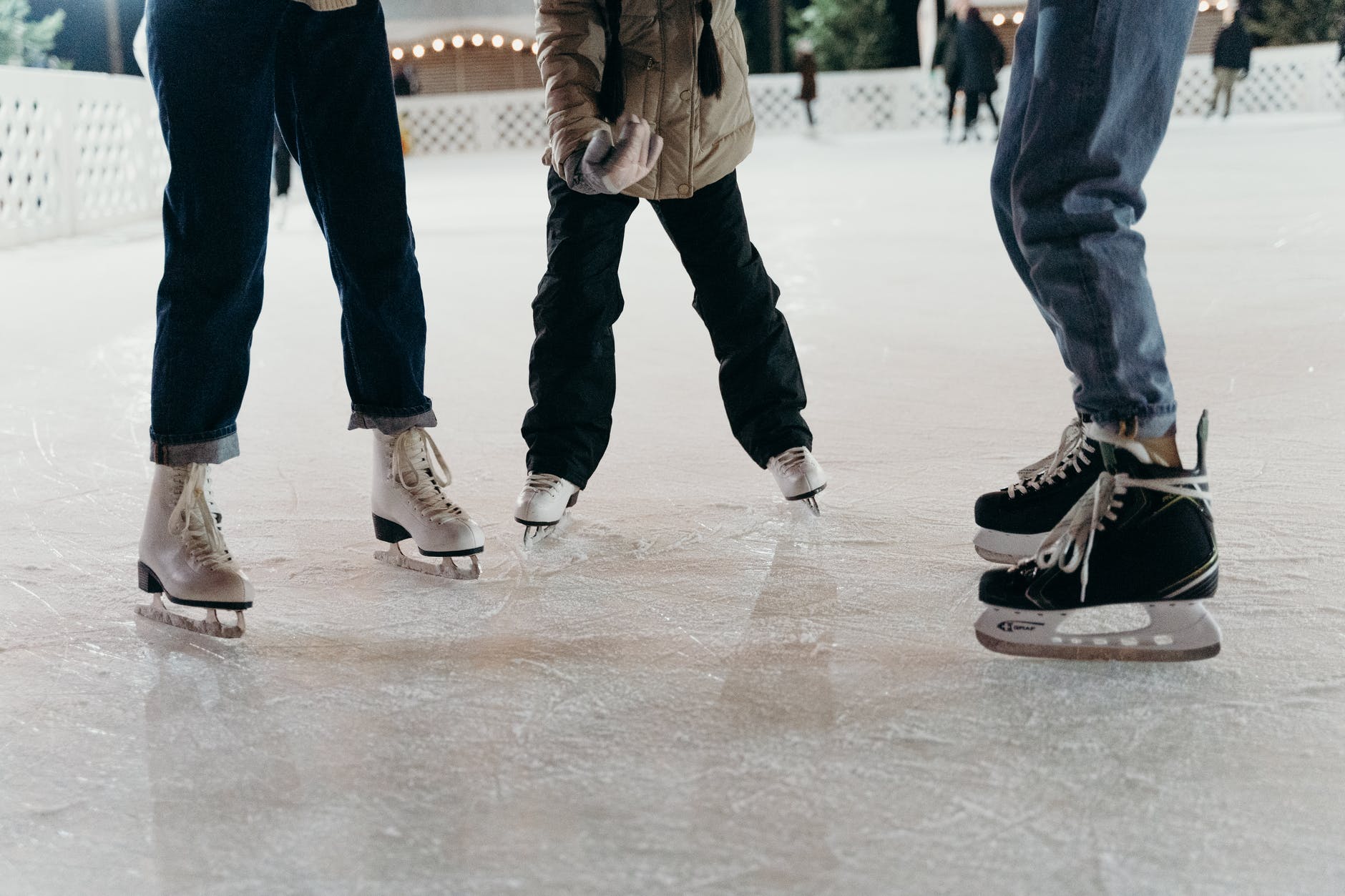 people ice skating together